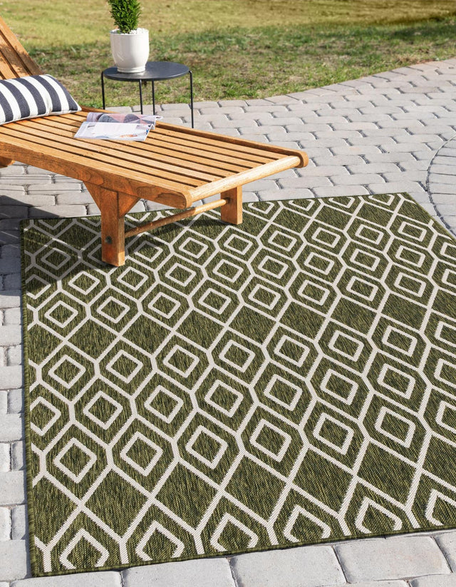 Green 4' 1 x 6' 1 Jill Zarin Outdoor Rectangle Area Rug Weather Resistant for Patio, Deck, Terrace, Balcony, Porch Durable 100% Polypropylene Carpet for Outside for Sale at Rug Engine