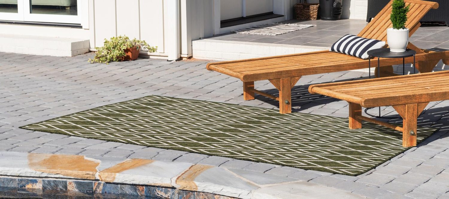 Green 4' 1 x 6' 1 Jill Zarin Outdoor Rectangle Area Rug Weather Resistant for Patio, Deck, Terrace, Balcony, Porch Durable 100% Polypropylene Carpet for Outside for Sale at Rug Engine