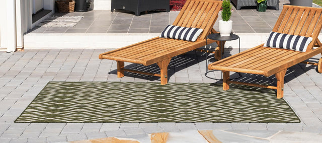 Green 4' 1 x 6' 1 Jill Zarin Outdoor Rectangle Area Rug Weather Resistant for Patio, Deck, Terrace, Balcony, Porch Durable 100% Polypropylene Carpet for Outside for Sale at Rug Engine