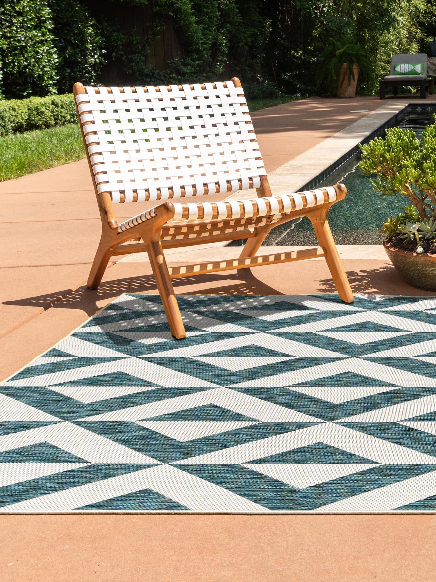 Teal 4' 1 x 6' 1 Jill Zarin Outdoor Rectangle Area Rug Weather Resistant for Patio, Deck, Terrace, Balcony, Porch Durable 100% Polypropylene Carpet for Outside for Sale at Rug Engine