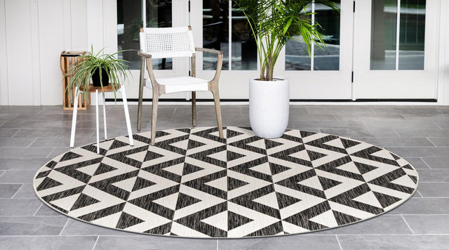 Charcoal Gray 6' 7 x 6' 7 Jill Zarin Outdoor Round Area Rug Weather Resistant for Patio, Deck, Terrace, Balcony, Porch Durable 100% Polypropylene Carpet for Outside for Sale at Rug Engine