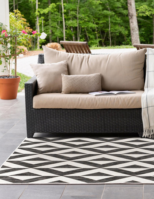 Charcoal Gray 4' 1 x 6' 1 Jill Zarin Outdoor Rectangle Area Rug Weather Resistant for Patio, Deck, Terrace, Balcony, Porch Durable 100% Polypropylene Carpet for Outside for Sale at Rug Engine