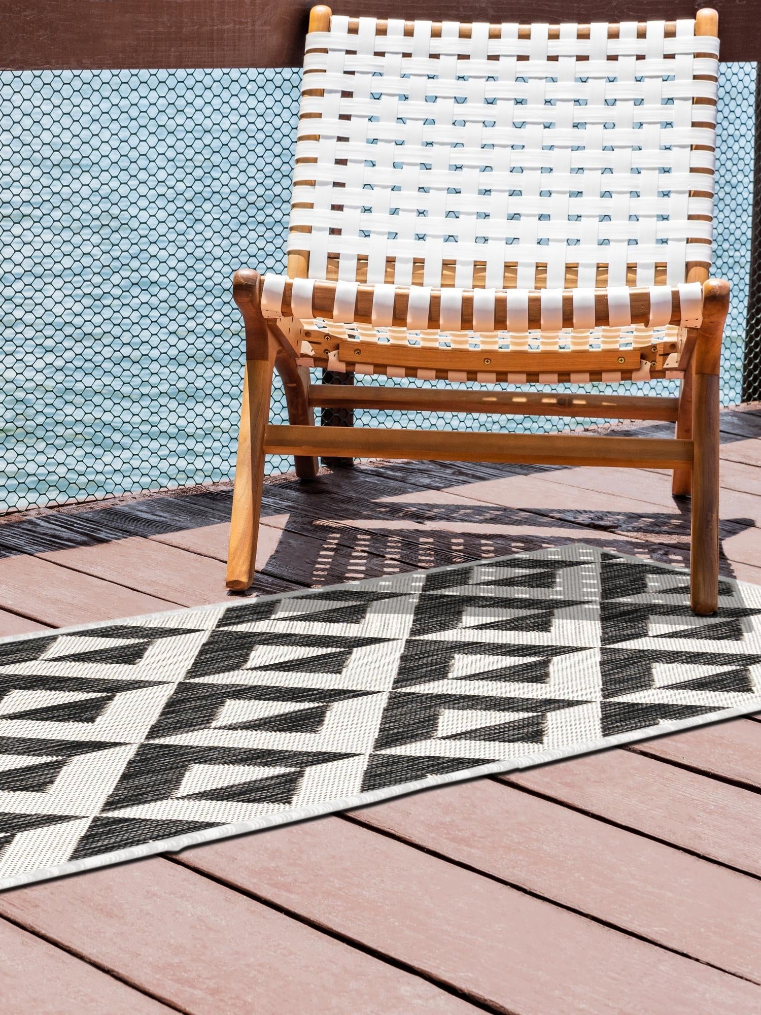 Charcoal Gray 2' 7 x 13' 1 Jill Zarin Outdoor Runner Area Rug Weather Resistant for Patio, Deck, Terrace, Balcony, Porch Durable 100% Polypropylene Carpet for Outside for Sale at Rug Engine