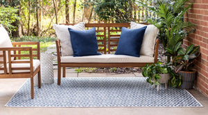 Blue 4' 1 x 6' 1 Jill Zarin Outdoor Rectangle Area Rug Weather Resistant for Patio, Deck, Terrace, Balcony, Porch Durable 100% Polypropylene Carpet for Outside for Sale at Rug Engine