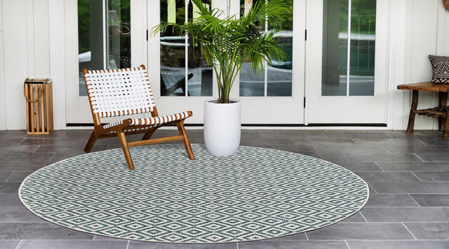 Teal 4' 1 x 4' 1 Jill Zarin Outdoor Round Area Rug Weather Resistant for Patio, Deck, Terrace, Balcony, Porch Durable 100% Polypropylene Carpet for Outside for Sale at Rug Engine