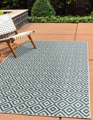 Teal 6' 1 x 9' Jill Zarin Outdoor Rectangle Area Rug Weather Resistant for Patio, Deck, Terrace, Balcony, Porch Durable 100% Polypropylene Carpet for Outside for Sale at Rug Engine