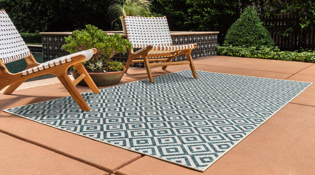 Teal 6' 1 x 9' Jill Zarin Outdoor Rectangle Area Rug Weather Resistant for Patio, Deck, Terrace, Balcony, Porch Durable 100% Polypropylene Carpet for Outside for Sale at Rug Engine