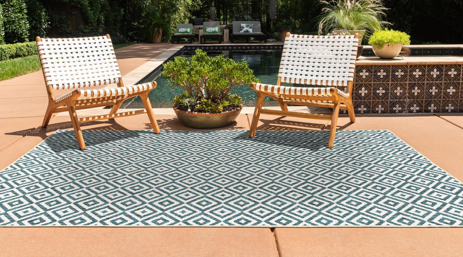 Teal 6' 1 x 9' Jill Zarin Outdoor Rectangle Area Rug Weather Resistant for Patio, Deck, Terrace, Balcony, Porch Durable 100% Polypropylene Carpet for Outside for Sale at Rug Engine