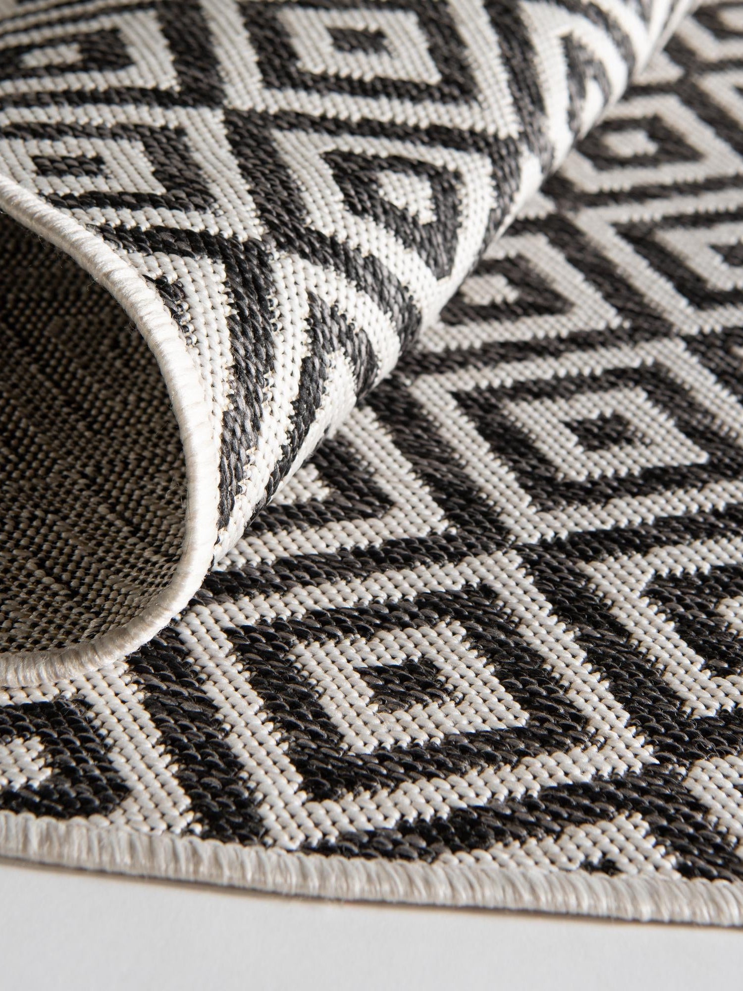 Charcoal Gray 7' 10 x 7' 10 Jill Zarin Outdoor Round Area Rug Weather Resistant for Patio, Deck, Terrace, Balcony, Porch Durable 100% Polypropylene Carpet for Outside for Sale at Rug Engine