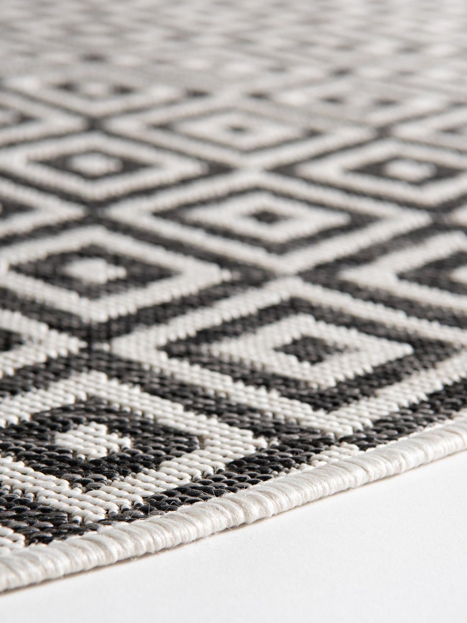Charcoal Gray 4' 1 x 4' 1 Jill Zarin Outdoor Round Area Rug Weather Resistant for Patio, Deck, Terrace, Balcony, Porch Durable 100% Polypropylene Carpet for Outside for Sale at Rug Engine