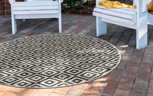 Charcoal Gray 12' x 12' Jill Zarin Outdoor Round Area Rug Weather Resistant for Patio, Deck, Terrace, Balcony, Porch Durable 100% Polypropylene Carpet for Outside for Sale at Rug Engine