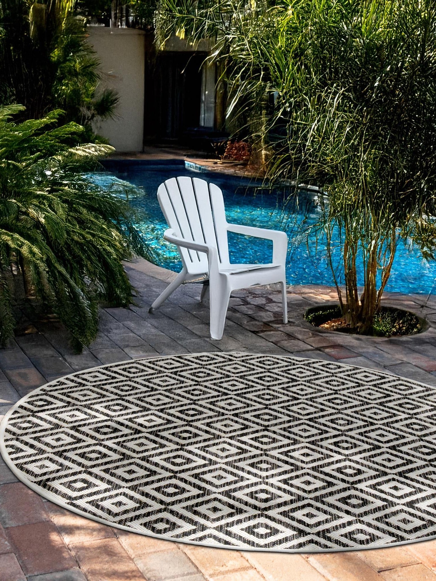 Charcoal Gray 10' x 10' Jill Zarin Outdoor Round Area Rug Weather Resistant for Patio, Deck, Terrace, Balcony, Porch Durable 100% Polypropylene Carpet for Outside for Sale at Rug Engine
