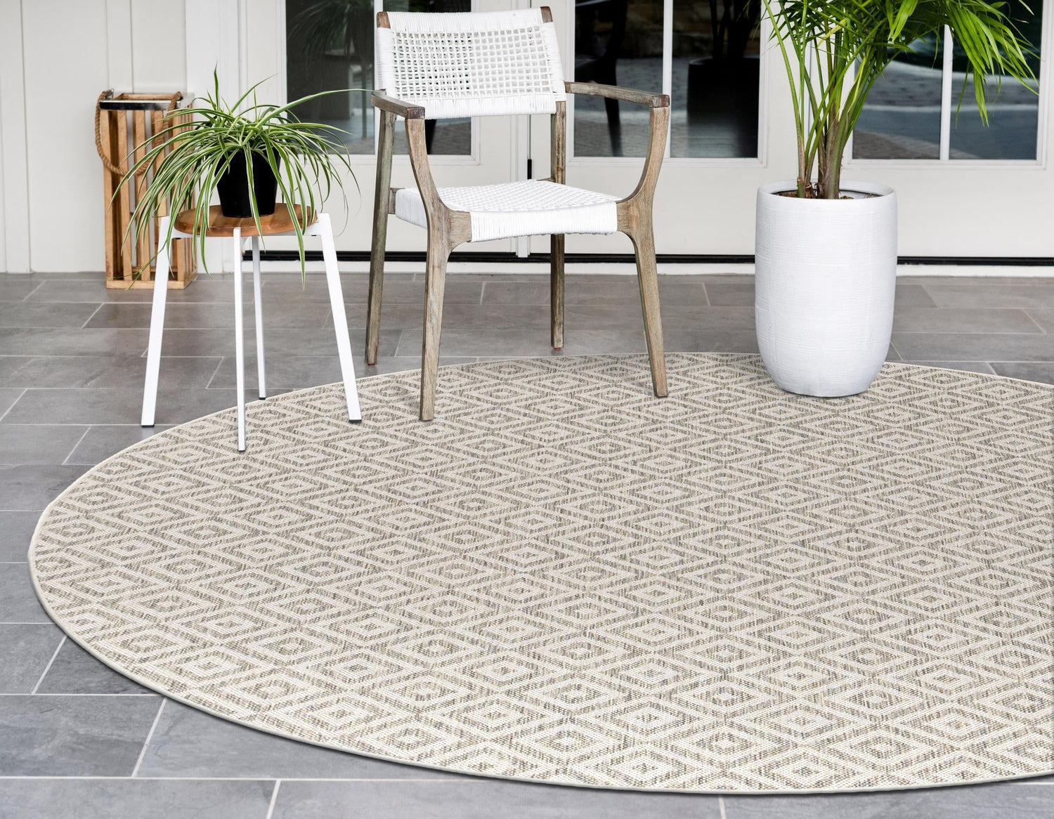 Light Gray 6' 7 x 6' 7 Jill Zarin Outdoor Round Area Rug Weather Resistant for Patio, Deck, Terrace, Balcony, Porch Durable 100% Polypropylene Carpet for Outside for Sale at Rug Engine