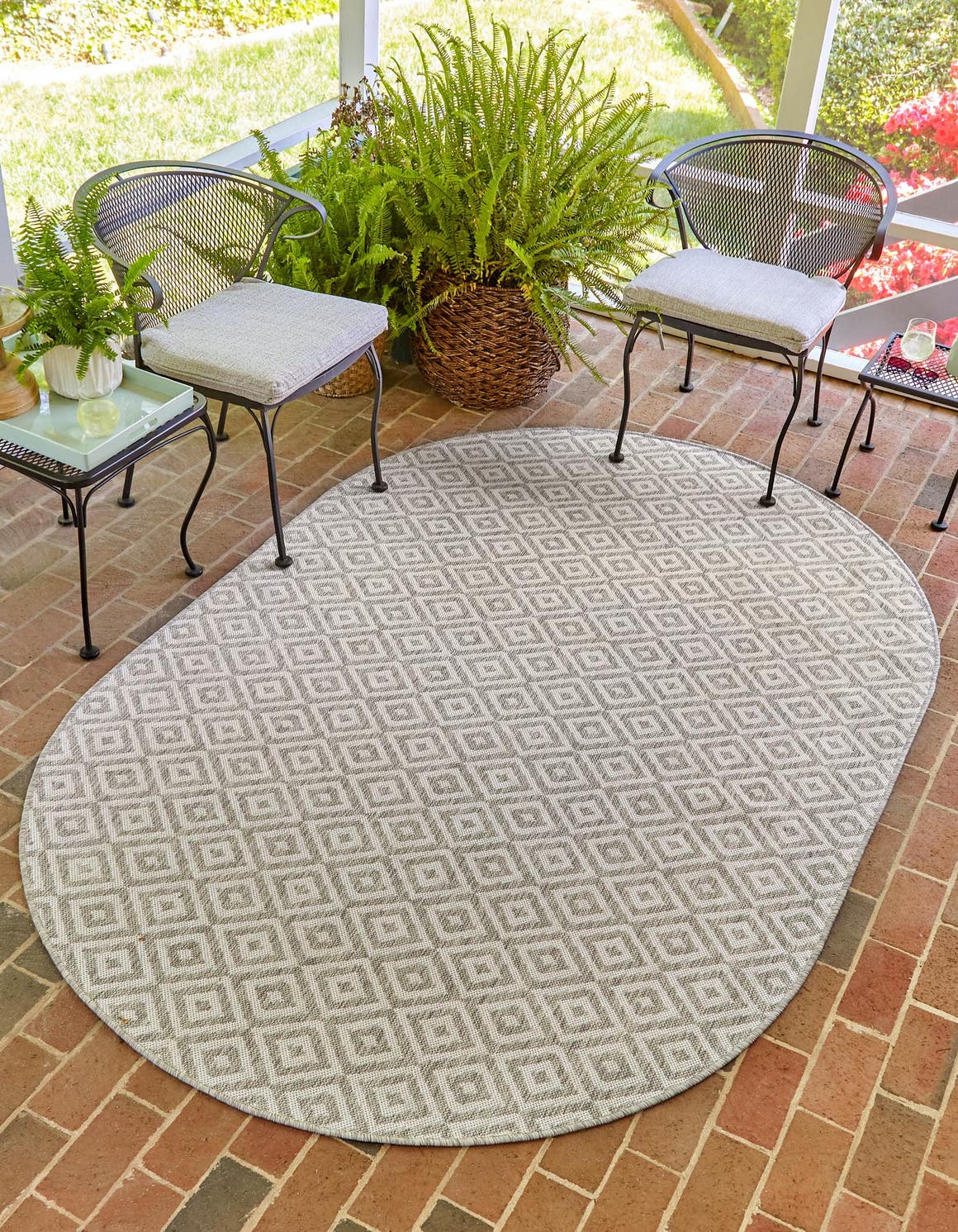 Light Gray 5' 3 x 8' Jill Zarin Outdoor Oval Area Rug Weather Resistant for Patio, Deck, Terrace, Balcony, Porch Durable 100% Polypropylene Carpet for Outside for Sale at Rug Engine