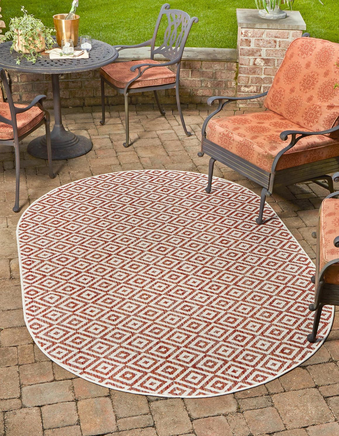 Rust Red 5' 3 x 8' Jill Zarin Outdoor Oval Area Rug Weather Resistant for Patio, Deck, Terrace, Balcony, Porch Durable 100% Polypropylene Carpet for Outside for Sale at Rug Engine