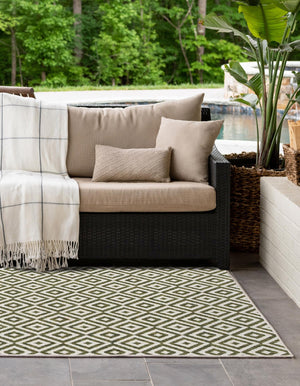 Green 4' 1 x 6' 1 Jill Zarin Outdoor Rectangle Area Rug Weather Resistant for Patio, Deck, Terrace, Balcony, Porch Durable 100% Polypropylene Carpet for Outside for Sale at Rug Engine