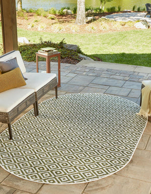Green 5' 3 x 8' Jill Zarin Outdoor Oval Area Rug Weather Resistant for Patio, Deck, Terrace, Balcony, Porch Durable 100% Polypropylene Carpet for Outside for Sale at Rug Engine