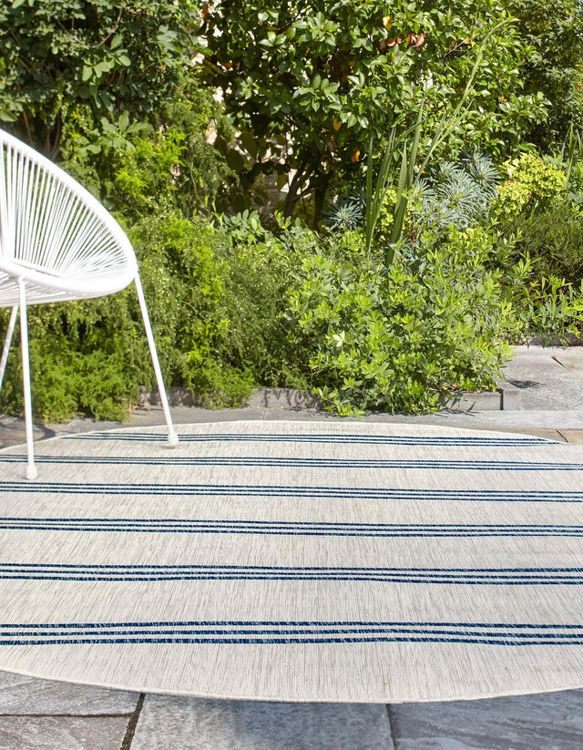 Ivory 5' 3 x 8' Jill Zarin Outdoor Oval Area Rug Weather Resistant for Patio, Deck, Terrace, Balcony, Porch Durable 100% Polypropylene Carpet for Outside for Sale at Rug Engine