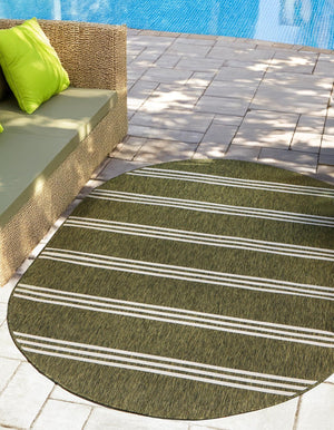 Green 7' 10 x 10' Jill Zarin Outdoor Oval Area Rug Weather Resistant for Patio, Deck, Terrace, Balcony, Porch Durable 100% Polypropylene Carpet for Outside for Sale at Rug Engine