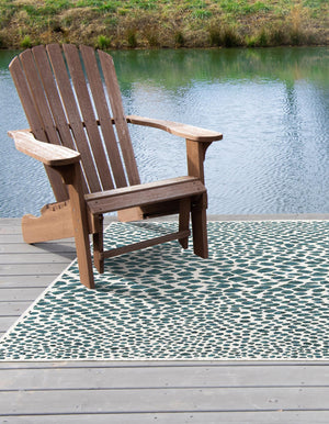 Teal 6' 1 x 9' Jill Zarin Outdoor Rectangle Area Rug Weather Resistant for Patio, Deck, Terrace, Balcony, Porch Durable 100% Polypropylene Carpet for Outside for Sale at Rug Engine