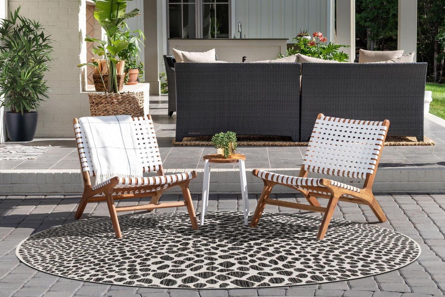 Black 3' 1 x 3' 1 Jill Zarin Outdoor Round Area Rug Weather Resistant for Patio, Deck, Terrace, Balcony, Porch Durable 100% Polypropylene Carpet for Outside for Sale at Rug Engine