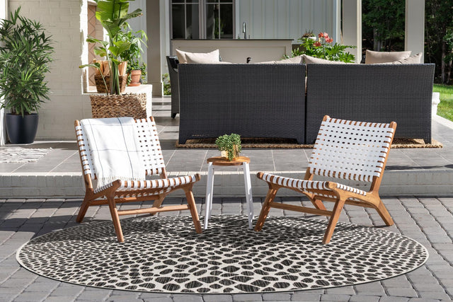 Black 7' 10 x 7' 10 Jill Zarin Outdoor Round Area Rug Weather Resistant for Patio, Deck, Terrace, Balcony, Porch Durable 100% Polypropylene Carpet for Outside for Sale at Rug Engine