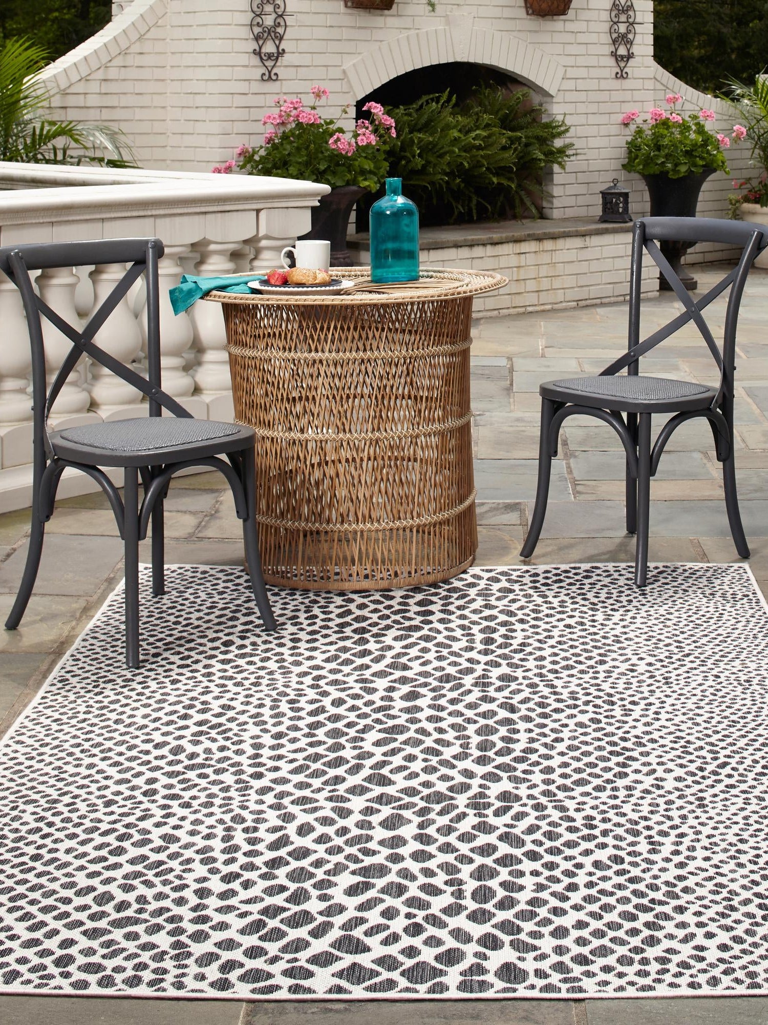Black 5' 3 x 8' Jill Zarin Outdoor Rectangle Area Rug Weather Resistant for Patio, Deck, Terrace, Balcony, Porch Durable 100% Polypropylene Carpet for Outside for Sale at Rug Engine