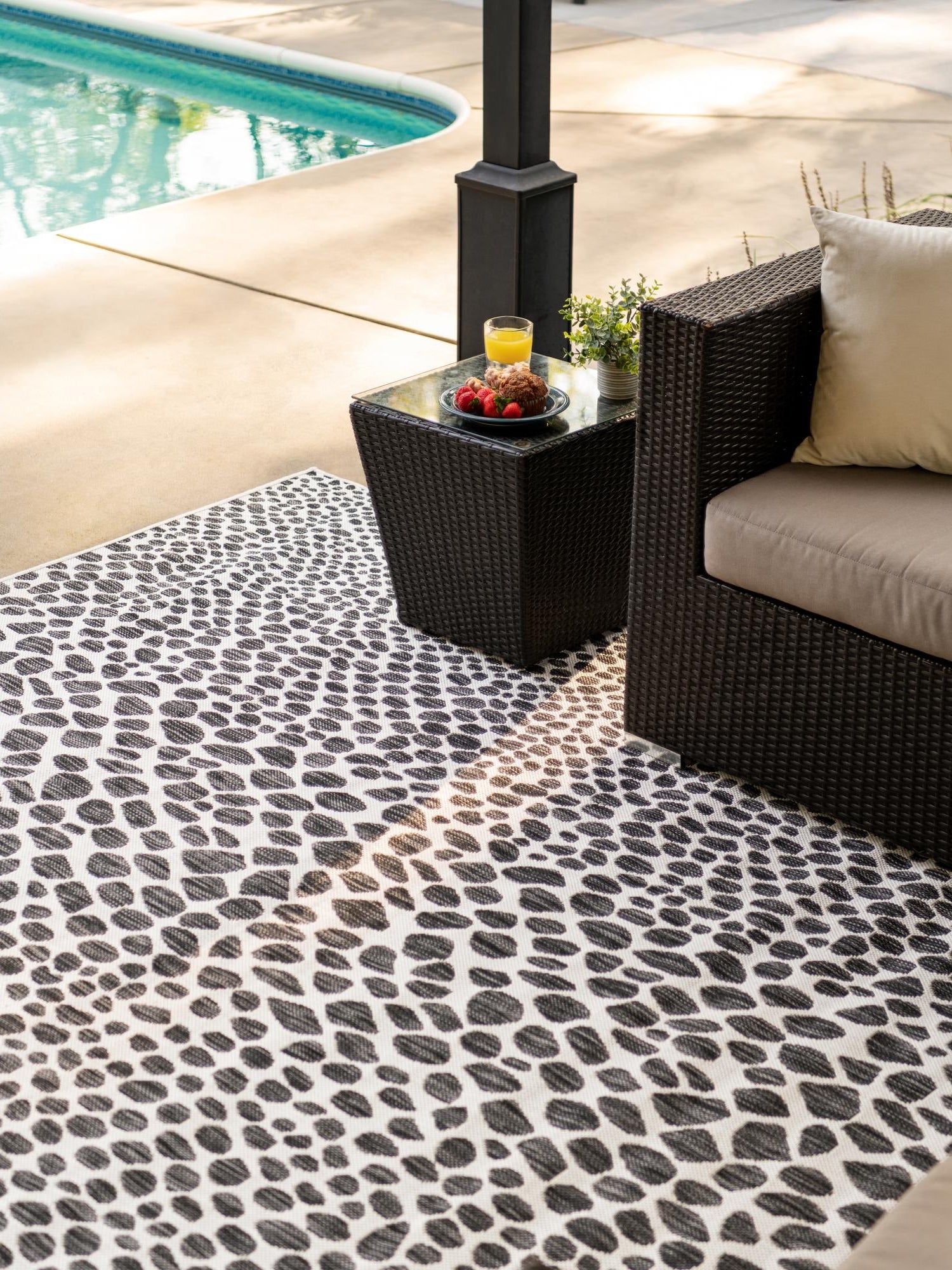 Black 5' 3 x 8' Jill Zarin Outdoor Rectangle Area Rug Weather Resistant for Patio, Deck, Terrace, Balcony, Porch Durable 100% Polypropylene Carpet for Outside for Sale at Rug Engine