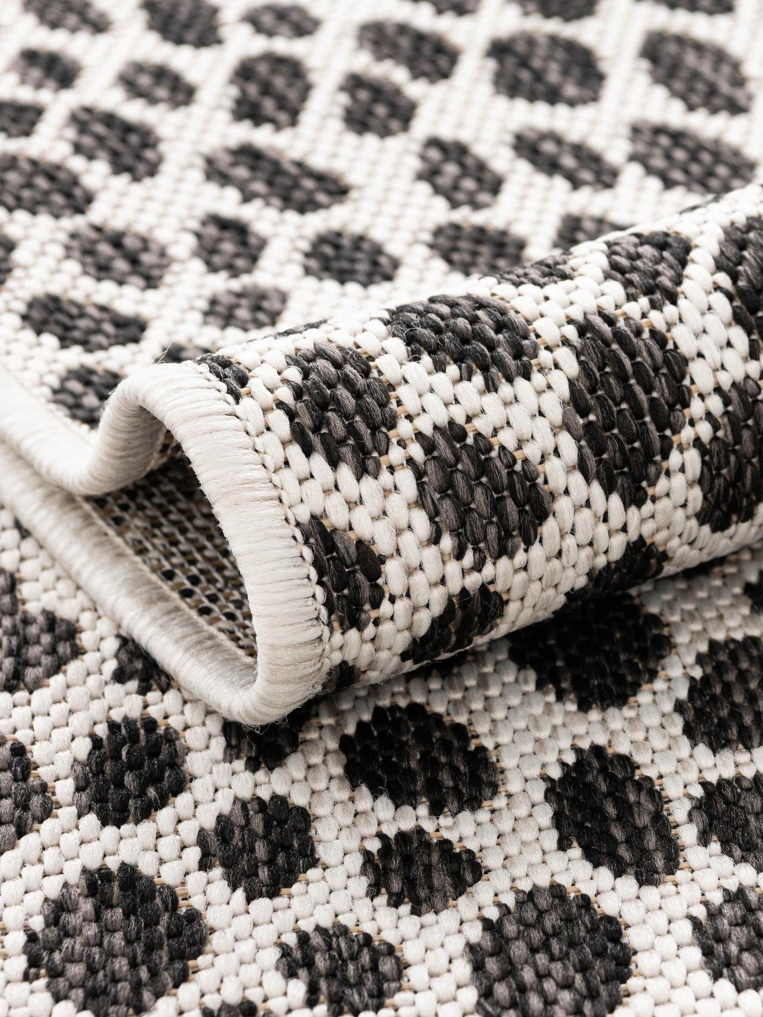 Black 9' x 12' Jill Zarin Outdoor Rectangle Area Rug Weather Resistant for Patio, Deck, Terrace, Balcony, Porch Durable 100% Polypropylene Carpet for Outside for Sale at Rug Engine