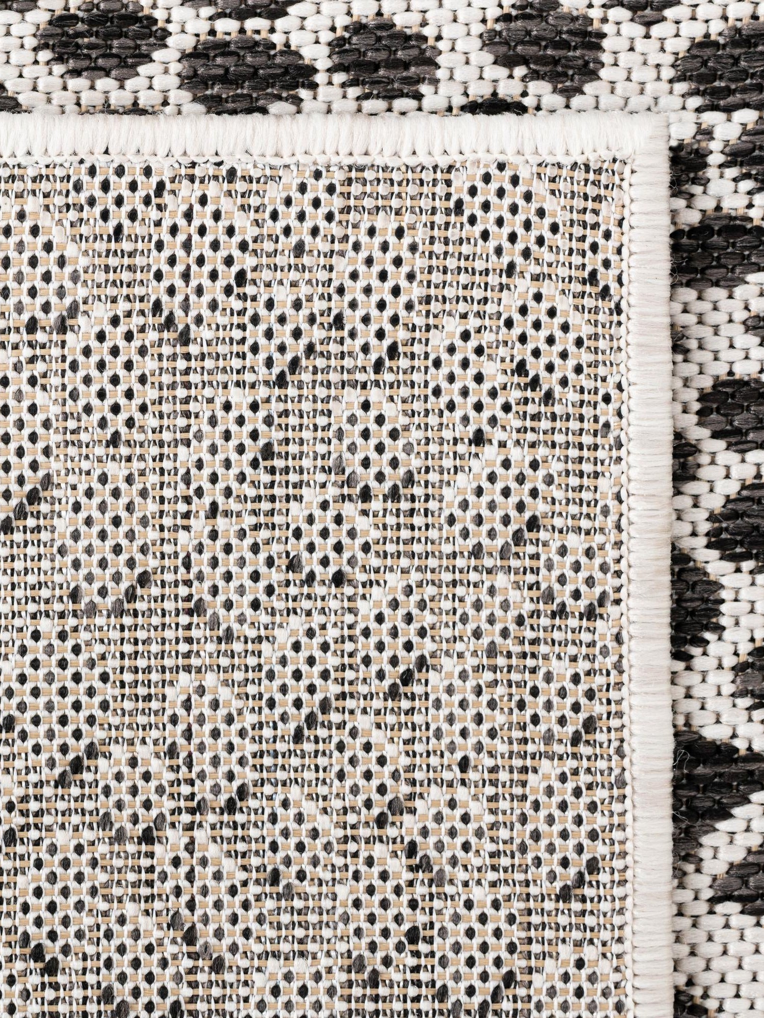 Black 6' 1 x 9' Jill Zarin Outdoor Rectangle Area Rug Weather Resistant for Patio, Deck, Terrace, Balcony, Porch Durable 100% Polypropylene Carpet for Outside for Sale at Rug Engine
