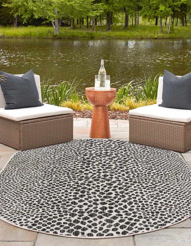Black 7' 10 x 10' Jill Zarin Outdoor Oval Area Rug Weather Resistant for Patio, Deck, Terrace, Balcony, Porch Durable 100% Polypropylene Carpet for Outside for Sale at Rug Engine