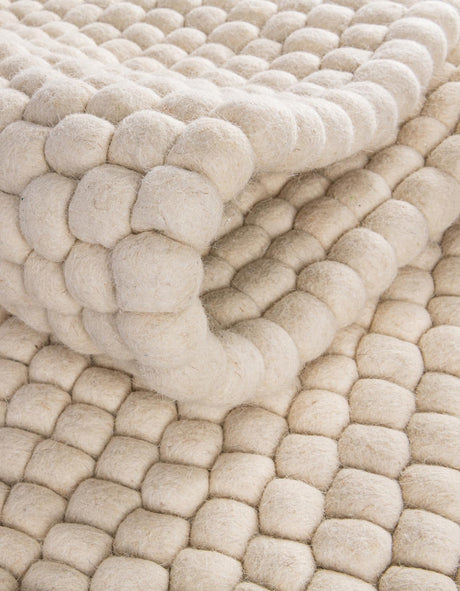 Ivory 4' 1 x 6' 1 Felt Ball Rectangle Area Rug Stunning All Natural 100% Wool Luxury Hand Woven Carpet for Modern Home Interiors Soft Touch Marshmallow Rug for Sale at Rug Engine