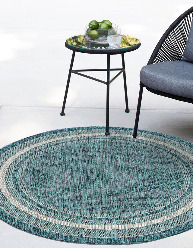 Teal 5' 3 x 5' 3 Outdoor Border Round Area Rug Weather Resistant for Patio, Deck, Terrace, Balcony, Porch 100% Polypropylene Classic Bordered Carpet for Sale at Rug Engine