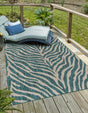 Teal 5' 3 x 8' Outdoor Safari Rectangle Area Rug Weather Resistant for Patio, Deck, Terrace, Balcony, Porch Animal Print Wildlife Nature Carpet for Sale at Rug Engine