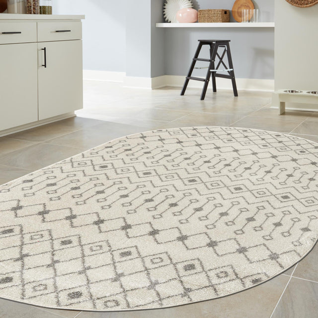 Ivory and Gray 4' 1 x 6' 1 Tribal Trellis Oval Area Rug Geometric Southwestern Inspired Durable Carpet for Home Interior Design for Sale at Rug Engine