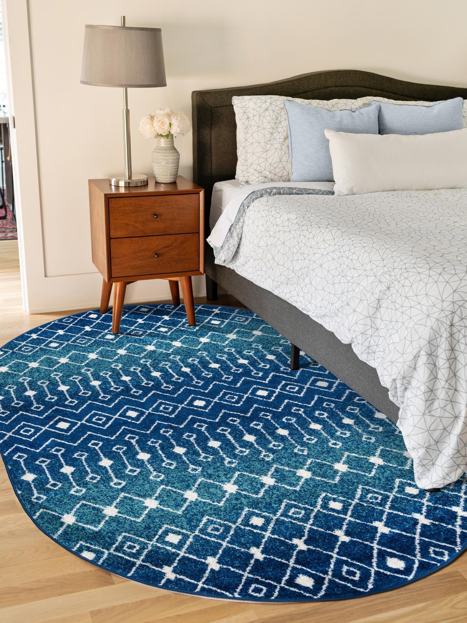 Navy and Teal 4' 1 x 6' 1 Tribal Trellis Oval Area Rug Geometric Southwestern Inspired Durable Carpet for Home Interior Design for Sale at Rug Engine