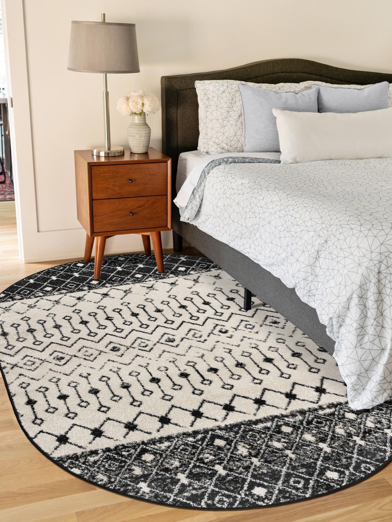 Black and White 4' 1 x 6' 1 Tribal Trellis Oval Area Rug Geometric Southwestern Inspired Durable Carpet for Home Interior Design for Sale at Rug Engine