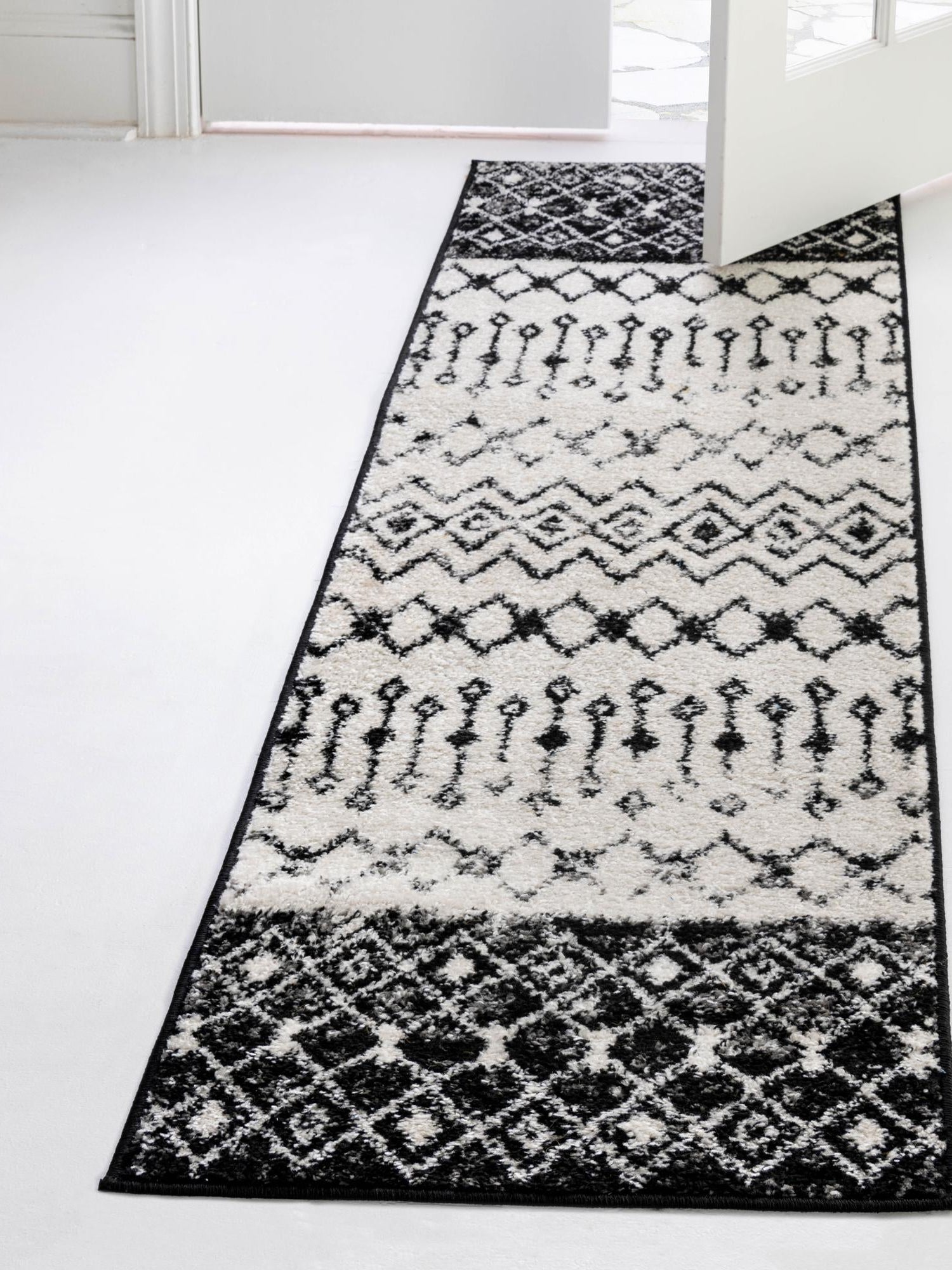 Black and White 2' x 6' 1 Tribal Trellis Runner Area Rug Geometric Southwestern Inspired Durable Carpet for Home Interior Design for Sale at Rug Engine