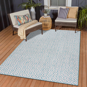Pink and Aqua 6' 1 x 9' Jill Zarin Outdoor Rectangle Area Rug Weather Resistant for Patio, Deck, Terrace, Balcony, Porch Durable 100% Polypropylene Carpet for Outside for Sale at Rug Engine