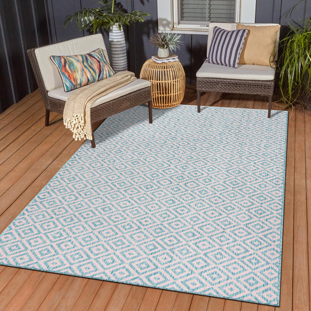 Pink and Aqua 6' 1 x 9' Jill Zarin Outdoor Rectangle Area Rug Weather Resistant for Patio, Deck, Terrace, Balcony, Porch Durable 100% Polypropylene Carpet for Outside for Sale at Rug Engine