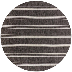 Charcoal 10' 8 x 10' 8 Jill Zarin Outdoor Round Area Rug Weather Resistant for Patio, Deck, Terrace, Balcony, Porch Durable 100% Polypropylene Carpet for Outside for Sale at Rug Engine