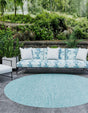 Aquamarine 10' 8 x 10' 8 Outdoor Solid Round Area Rug Weather Resistant for Patio, Deck, Terrace, Balcony, Porch 100% Polypropylene Minimalist Waterproof Carpet for Sale at Rug Engine