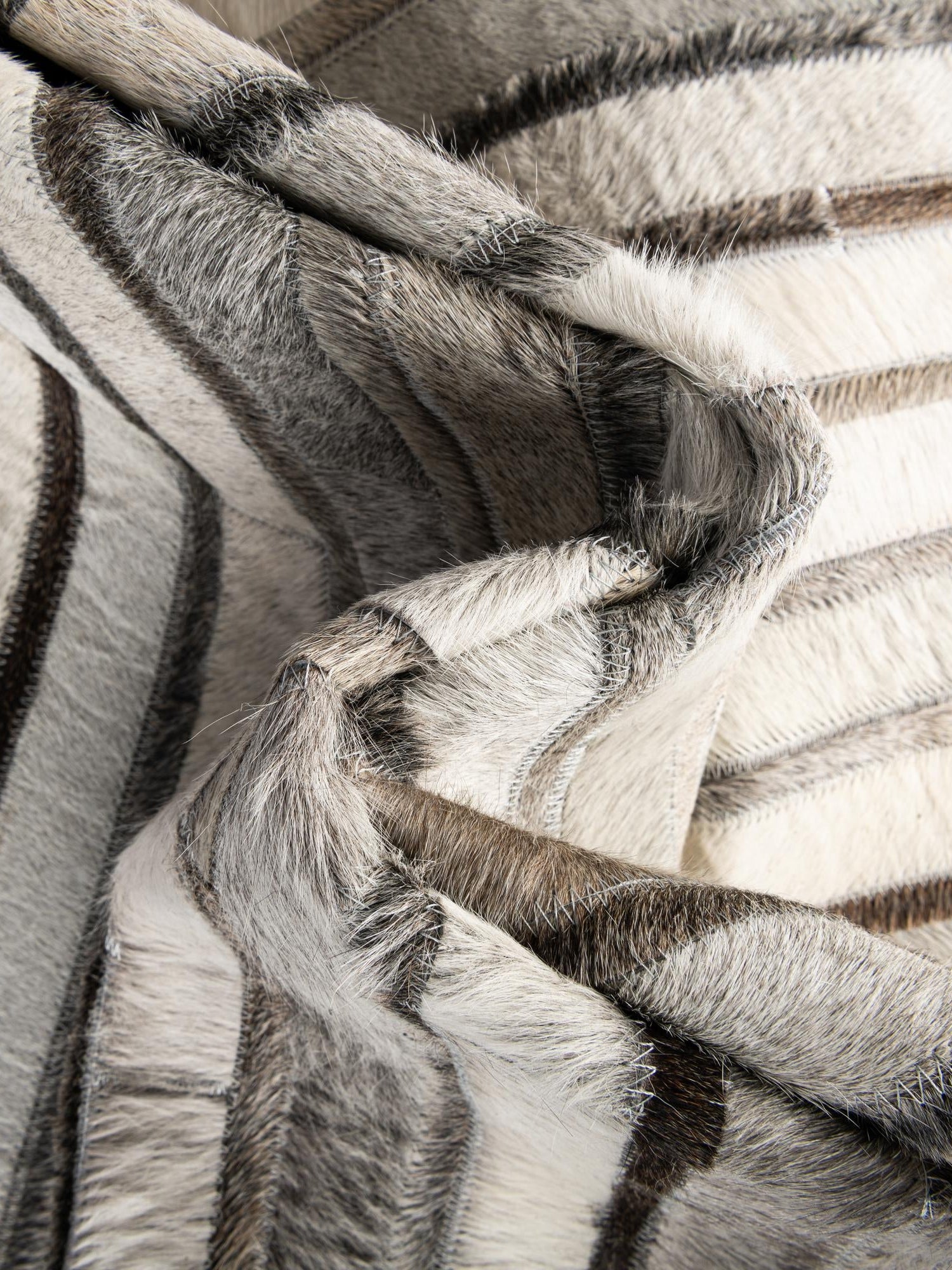 Authentic Luxury Gray Ivory 4' 1 x 4' 1 Cowhide Leather Round Area Rug Modern Interior Design 100% Real Natural Cowhide Carpet for Designer Home Decor for Sale at Rug Engine