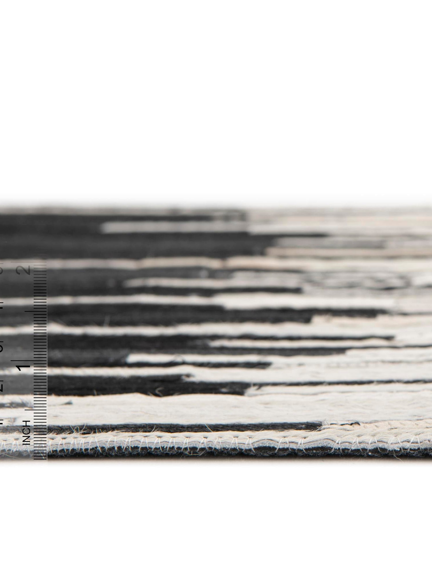 Authentic Luxury Black White 4' 1 x 4' 1 Cowhide Leather Round Area Rug Modern Interior Design 100% Real Natural Cowhide Carpet for Designer Home Decor for Sale at Rug Engine