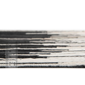 Black White 4' 1 x 4' 1 Cowhide Leather Round Rug