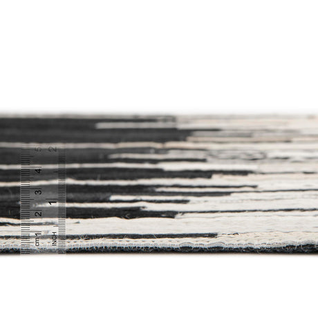 Authentic Luxury Black White 4' 1 x 4' 1 Cowhide Leather Round Area Rug Modern Interior Design 100% Real Natural Cowhide Carpet for Designer Home Decor for Sale at Rug Engine