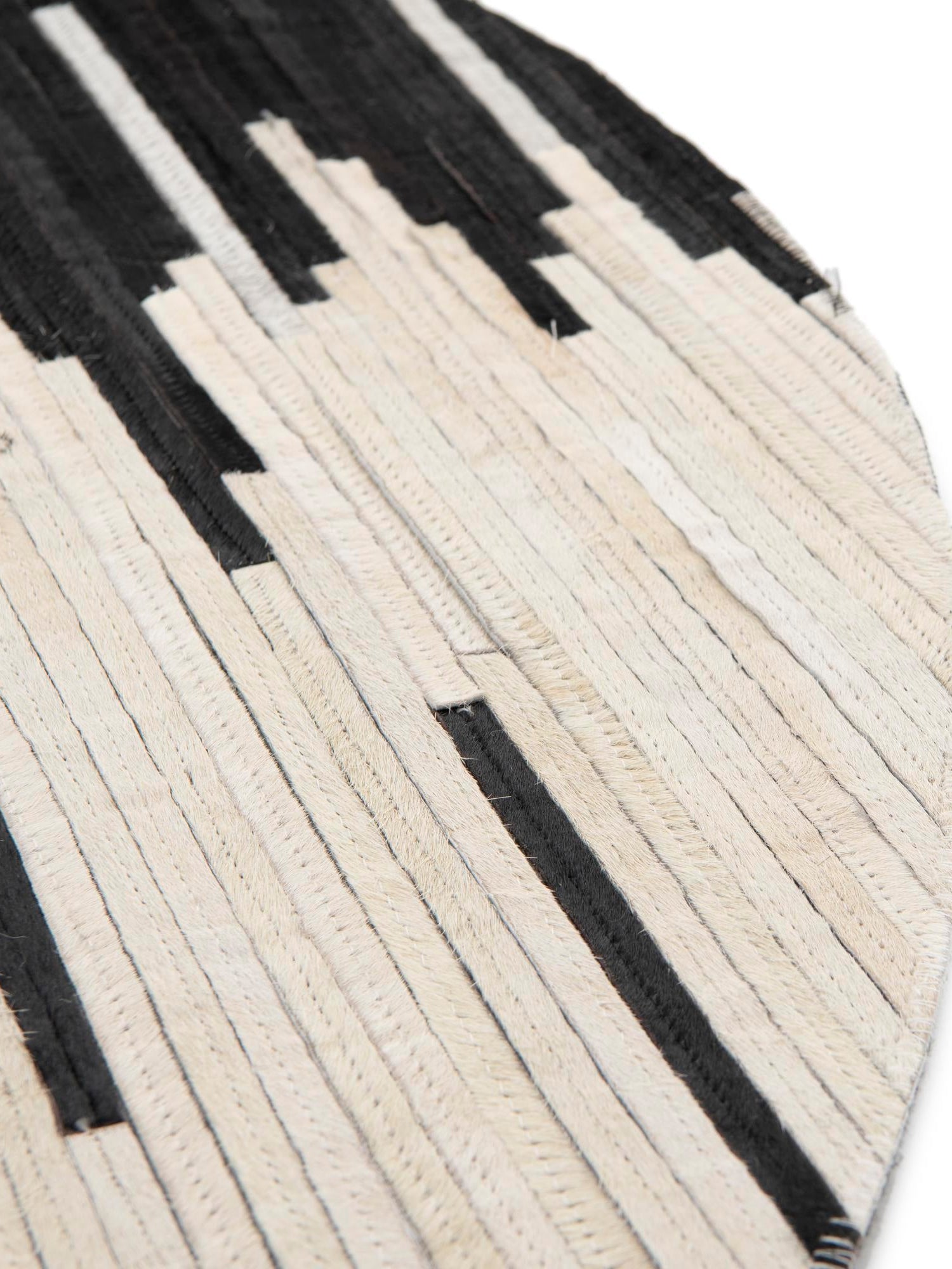 Authentic Luxury Black White 4' 1 x 4' 1 Cowhide Leather Round Area Rug Modern Interior Design 100% Real Natural Cowhide Carpet for Designer Home Decor for Sale at Rug Engine