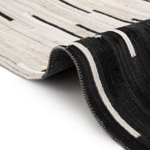 Black White 4' 1 x 4' 1 Cowhide Leather Round Rug