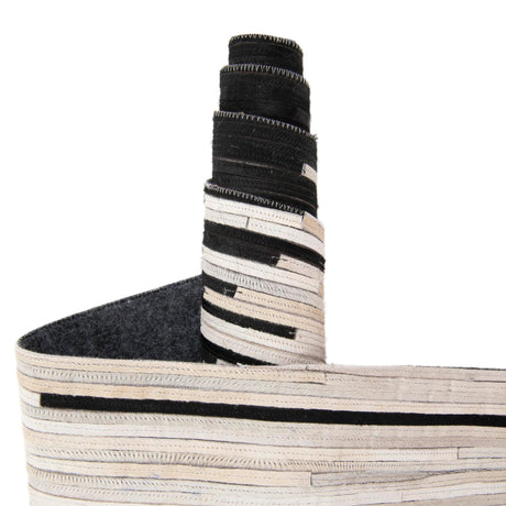 Authentic Luxury Black White 4' 1 x 4' 1 Cowhide Leather Round Area Rug Modern Interior Design 100% Real Natural Cowhide Carpet for Designer Home Decor for Sale at Rug Engine