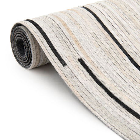 Authentic Luxury Black White 7' 10 x 7' 10 Cowhide Leather Round Area Rug Modern Interior Design 100% Real Natural Cowhide Carpet for Designer Home Decor for Sale at Rug Engine